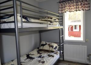Postel nebo postele na pokoji v ubytování K45 Mackenzie Cottage