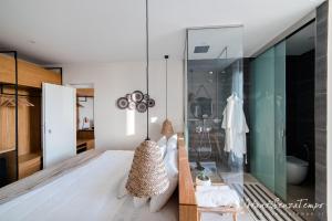 Ванная комната в Cumeja Beach Club & Hotel