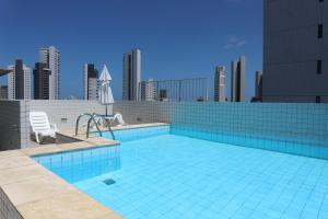 The swimming pool at or near Apartamento Alice Tenório