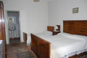 Postel nebo postele na pokoji v ubytování B&B Cascina Bricchetto