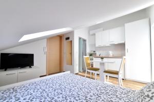 Køkken eller tekøkken på Piccolo Apartments