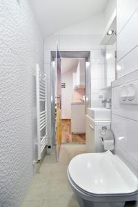 Et badeværelse på Piccolo Apartments