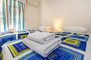 Posteľ alebo postele v izbe v ubytovaní Pisces - City Center Apartment