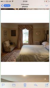 a picture of a bedroom with a bed and a window at 10 st james villas in Winchester