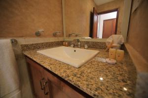 Een badkamer bij Hotel Playa Del Sol