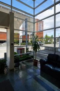 אזור ישיבה ב-Apart Hotel Aragon Portal