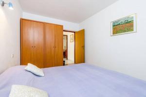 Postel nebo postele na pokoji v ubytování Apartments Nikola