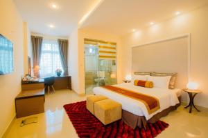 Ένα ή περισσότερα κρεβάτια σε δωμάτιο στο Smile Hotel