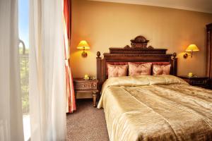 Een bed of bedden in een kamer bij Hotel Chinar