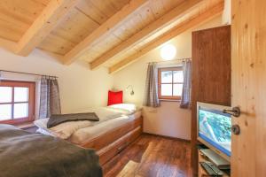 A bed or beds in a room at Das Prinzis