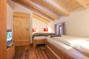 A bed or beds in a room at Das Prinzis