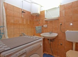 Kúpeľňa v ubytovaní Apartment Stipe 1444
