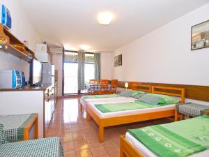Posteľ alebo postele v izbe v ubytovaní Apartment Stipe 1444