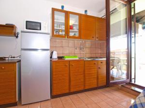 Kuchyňa alebo kuchynka v ubytovaní Apartment Stipe 1444
