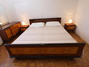 Cama ou camas em um quarto em Apartments Ivan 1031