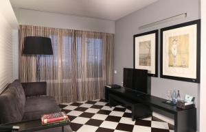 Hotel Gran Derby Suites, a Small Luxury Hotel of the World的休息区