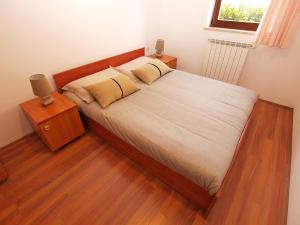 Postel nebo postele na pokoji v ubytování Apartments Dusanka 799