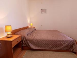 Postel nebo postele na pokoji v ubytování Apartments Dusanka 799