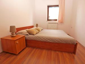 Postel nebo postele na pokoji v ubytování Apartments Dusanka 799
