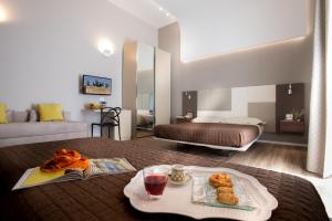 A bed or beds in a room at B&B In Centro Palermo