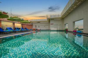 Welcomhotel by ITC Hotels, RaceCourse, Coimbatore tesisinde veya buraya yakın yüzme havuzu