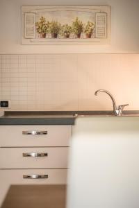 A kitchen or kitchenette at Residenza Finestra sul Parco