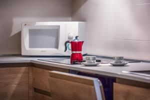 A kitchen or kitchenette at Residenza Finestra sul Parco
