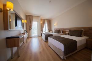 Postel nebo postele na pokoji v ubytování Hotel Greenland - All Inclusive