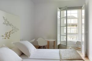 Postel nebo postele na pokoji v ubytování Hotel Pazo de Altamira