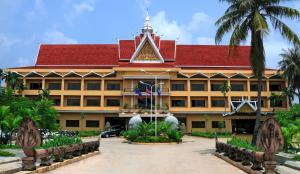 a large building with a red roof at Angkor Hotel in Siem Reap