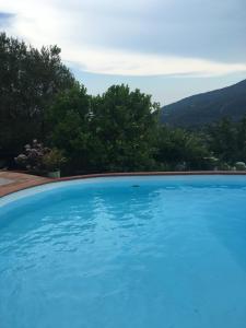 The swimming pool at or close to Villa Ludoniccò