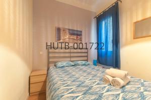 Posteľ alebo postele v izbe v ubytovaní Go-BCN Residence Sagrada Familia
