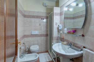 Koupelna v ubytování I Ginepri Hotel