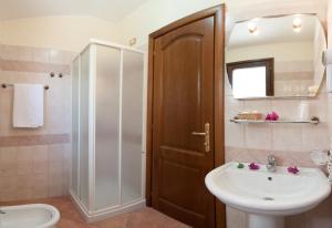 Koupelna v ubytování I Ginepri Hotel