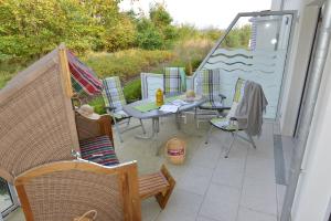 Balkón nebo terasa v ubytování Ferienwohnung Strandküken