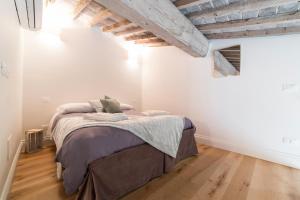 Posteľ alebo postele v izbe v ubytovaní Santa Croce apartment