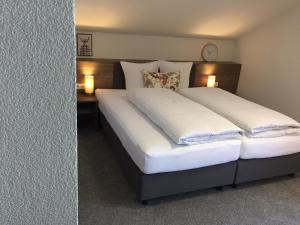 Posteľ alebo postele v izbe v ubytovaní Nonas B&B