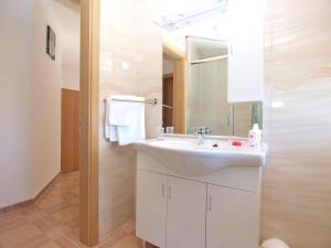 Kúpeľňa v ubytovaní Apartments Mala Vala 1332 + 37 fotografií