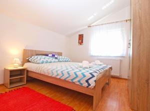 Posteľ alebo postele v izbe v ubytovaní Apartments Mala Vala 1332