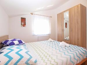 Posteľ alebo postele v izbe v ubytovaní Apartments Mala Vala 1332