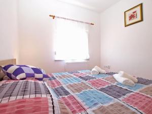 Posteľ alebo postele v izbe v ubytovaní Apartments Mala Vala 1332