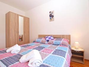 Posteľ alebo postele v izbe v ubytovaní Apartments Mala Vala 1332