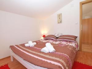 Posteľ alebo postele v izbe v ubytovaní Apartments Mala Vala 1332