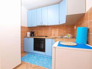 Kuchyňa alebo kuchynka v ubytovaní Apartments Mala Vala 1332