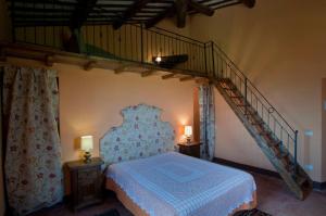 En eller flere senger på et rom på Il Torrino del Povile