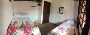 Postel nebo postele na pokoji v ubytování Fami Hotel Vive Jardin
