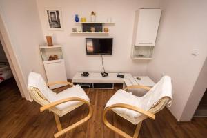 TV a/nebo společenská místnost v ubytování Holiday Home Fasana