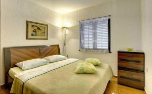 Postel nebo postele na pokoji v ubytování Villa Ruza + 23 fotografií