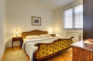 Postel nebo postele na pokoji v ubytování Villa Ruza