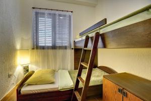 Postel nebo postele na pokoji v ubytování Villa Ruza